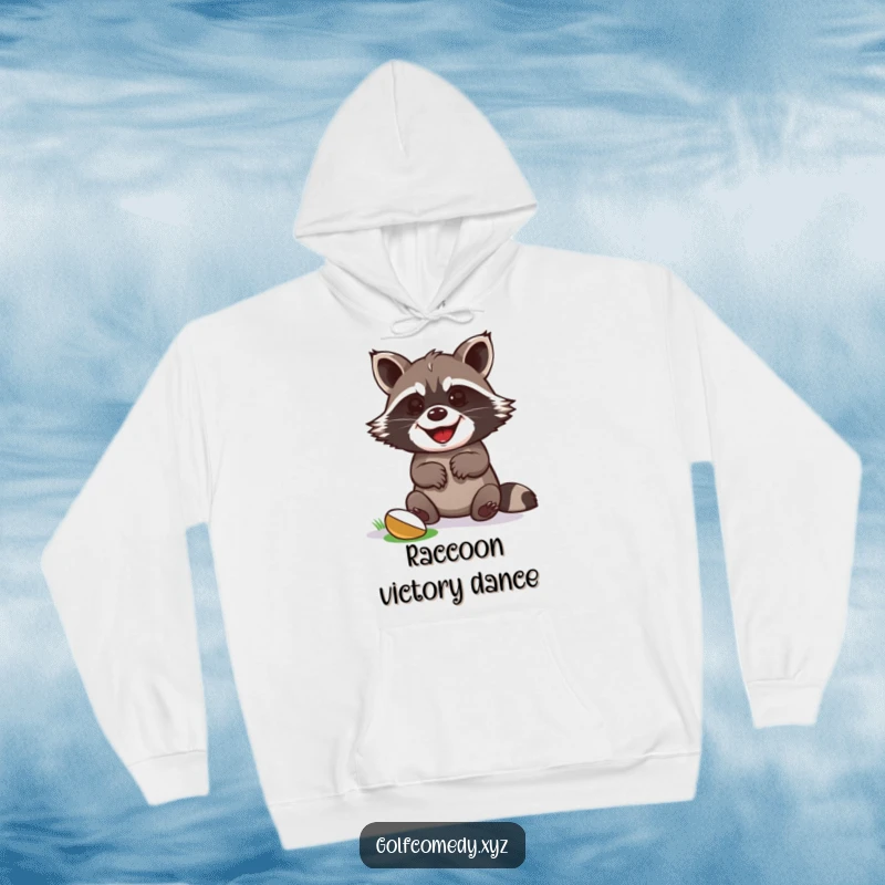 Funny raccoon celebrating a golf putt victory with paws up, on a warm hoodie for celebratory golfers.
